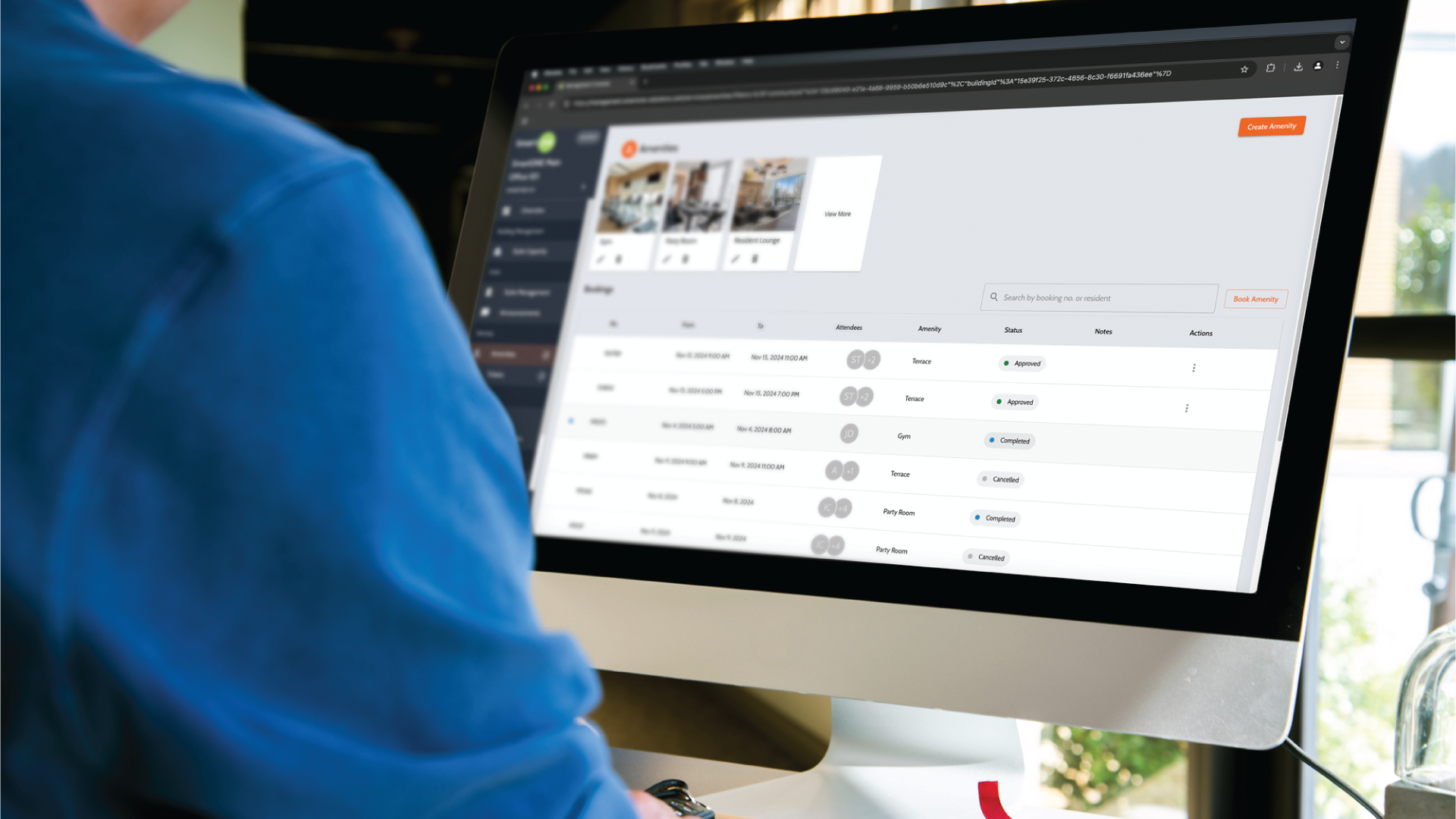 Property Manager looking at computer